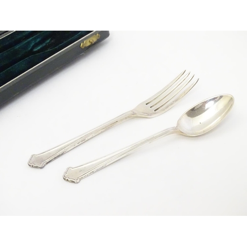 324 - A silver Christening set comprising spoon and fork, hallmarked Birmingham 1959, maker Elkington & Co... 