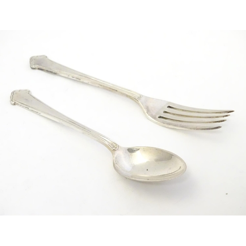 324 - A silver Christening set comprising spoon and fork, hallmarked Birmingham 1959, maker Elkington & Co... 