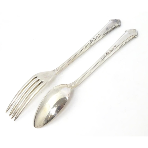 324 - A silver Christening set comprising spoon and fork, hallmarked Birmingham 1959, maker Elkington & Co... 