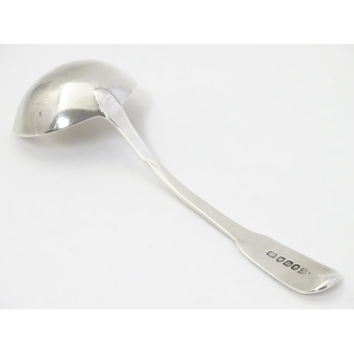 330 - A Geo III silver fiddle pattern sauce ladle hallmarked London 1799 maker  William Ely and William Fe... 