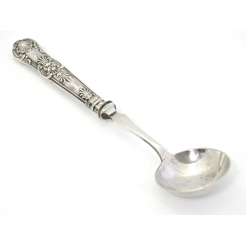 348 - A silver handled king's pattern jam / preserve spoon  with circular silver plated bowl. The handle h... 