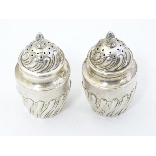 349 - A pair of Victorian silver pepperettes hallmarked Sheffield 1891 maker Harrison Brothers & Howson  2... 