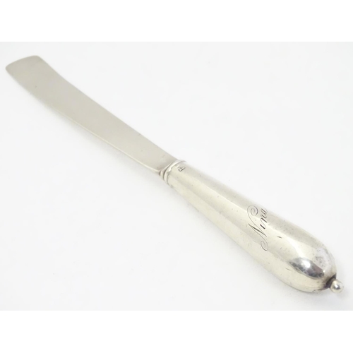 356 - A Victorian silver butter / spreader knife. The handle and blade hallmarked London 1862, maker Eliza... 