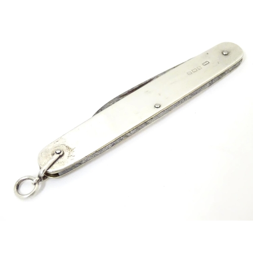 365 - A silver handled folding fruit knife, hallmarked Birmingham 1928, maker Cohen & Charles. 3