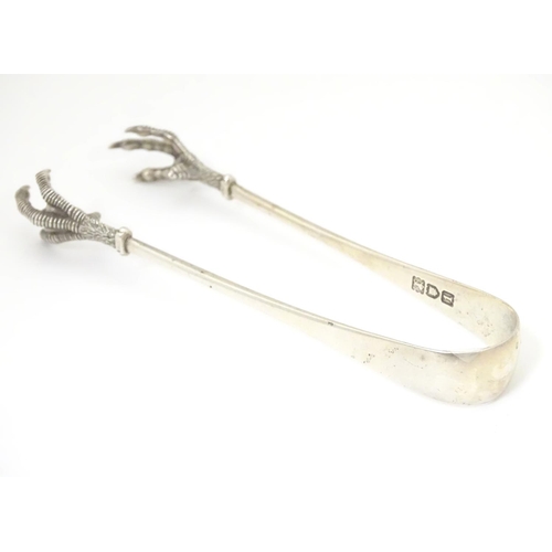 376 - Sugar tongs with birds claw grips hallmarked . London 1906 maker Robert Stebbings. Approx 5