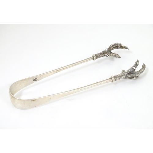 376 - Sugar tongs with birds claw grips hallmarked . London 1906 maker Robert Stebbings. Approx 5