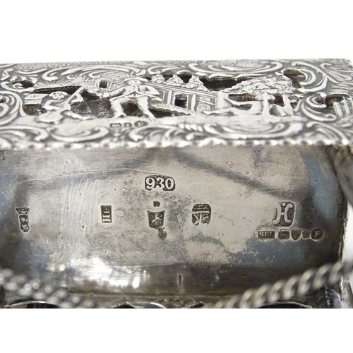 385 - A Continental silver novelty  pomander box formed as a drop flap table with figural and acanths deco... 