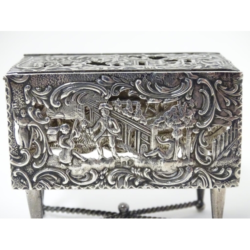 385 - A Continental silver novelty  pomander box formed as a drop flap table with figural and acanths deco... 