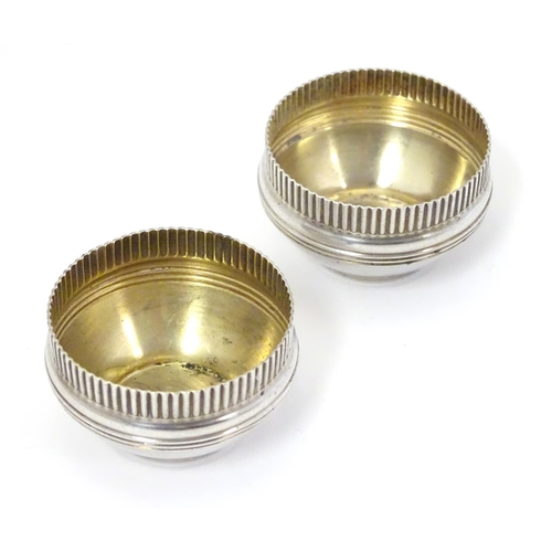 397 - A pair of American Sterling silver salts with gilded interiors. Maker Gorham Manufacturing Co. 1 3/4... 