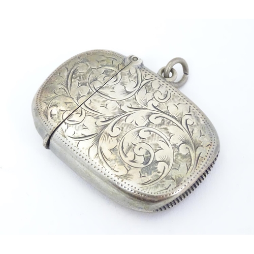 408 - A silver vesta case with engraved decoration maker Birmingham 1907 maker William M Hayes. 1 3/4