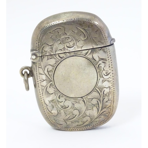 408 - A silver vesta case with engraved decoration maker Birmingham 1907 maker William M Hayes. 1 3/4