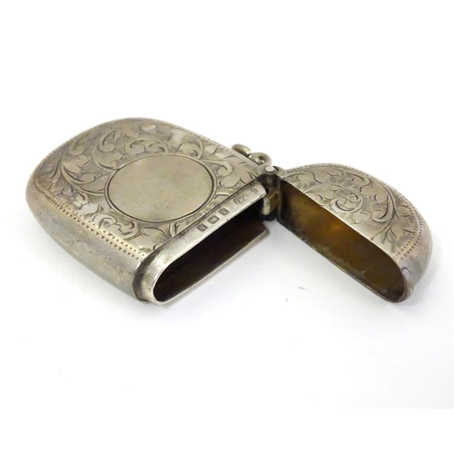 408 - A silver vesta case with engraved decoration maker Birmingham 1907 maker William M Hayes. 1 3/4