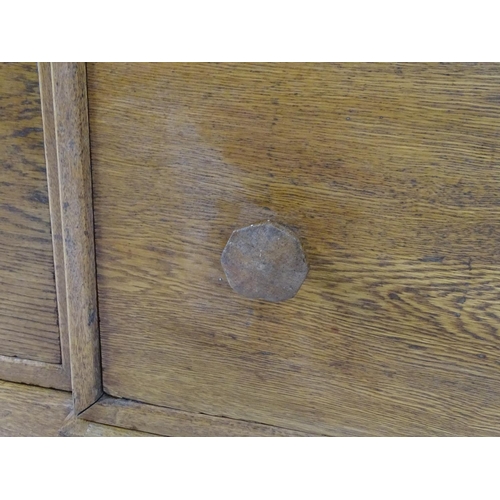 1369 - An early / mid 20thC oak combination wardrobe to a design by Peter Waals, Loughborough University. T... 