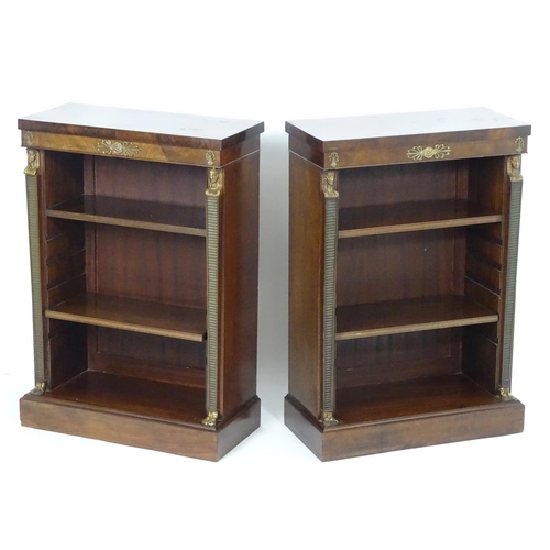 1372 - A pair of early 20thC Empire style mahogany bookcases, each having three shelves, gilt mounts and fl... 