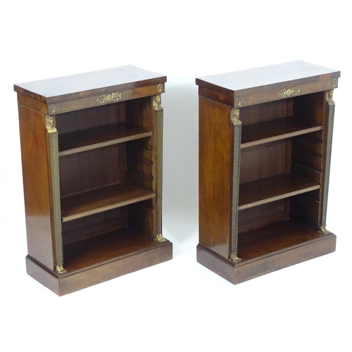 1372 - A pair of early 20thC Empire style mahogany bookcases, each having three shelves, gilt mounts and fl... 