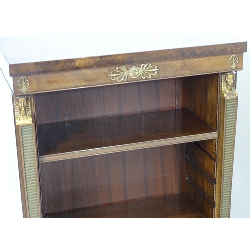 1372 - A pair of early 20thC Empire style mahogany bookcases, each having three shelves, gilt mounts and fl... 