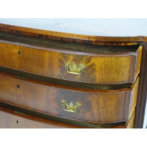 1379 - A mid / late 19thC mahogany bow fronted chest of drawers, comprising four long drawers with figured ... 