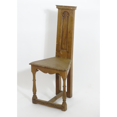 1392 - An early 20thC Arts and Crafts Shakespeare chair of oak construction , with a narrow panelled back a... 