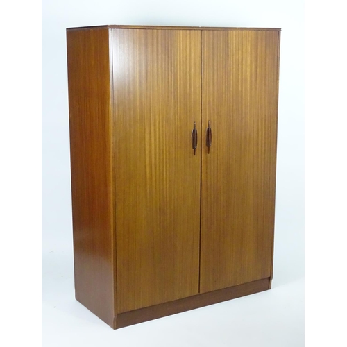 1564 - Vintage retro, mid-century: an afrormosia double wardrobe by Elliotts of Newbury, 48