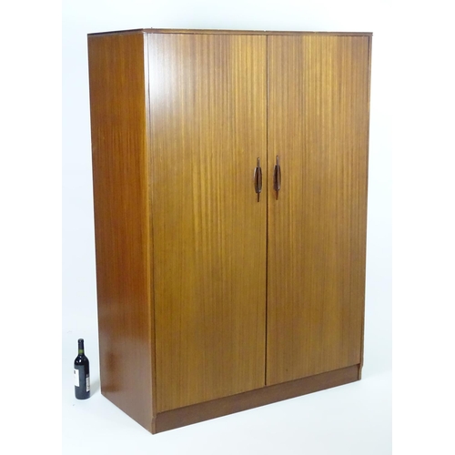 1564 - Vintage retro, mid-century: an afrormosia double wardrobe by Elliotts of Newbury, 48