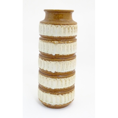 117 - A West German vase with banded detail in relief. Marked under. Approx. 16