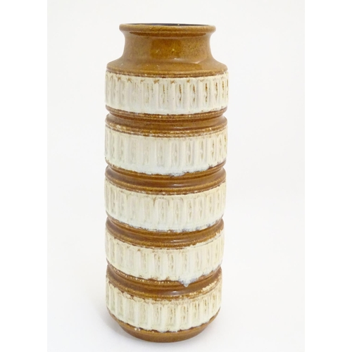 117 - A West German vase with banded detail in relief. Marked under. Approx. 16