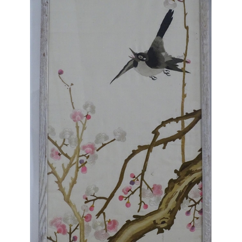 1360 - Three 20thC Chinese embroideries, comprising a bird in flight above branches of blossom, a crane in ... 