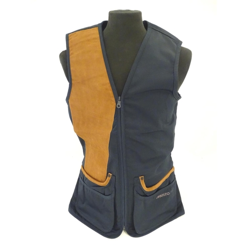 2033 - Sporting / Country pursuits: A Musto skeet vest / clay shooting gilet in Navy. Size M, new with tags... 