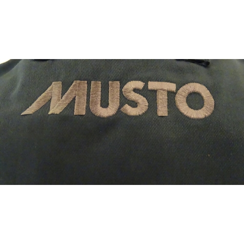 2033 - Sporting / Country pursuits: A Musto skeet vest / clay shooting gilet in Navy. Size M, new with tags... 