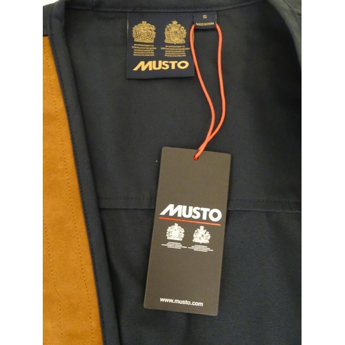 2033 - Sporting / Country pursuits: A Musto skeet vest / clay shooting gilet in Navy. Size M, new with tags... 