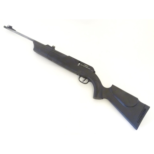 2045 - Air rifle: a Umarex 850 air magnum .22 CO2 bolt action airgun, 23 3/4 barrel fitted with open adjust... 