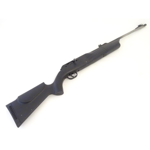 2045 - Air rifle: a Umarex 850 air magnum .22 CO2 bolt action airgun, 23 3/4 barrel fitted with open adjust... 