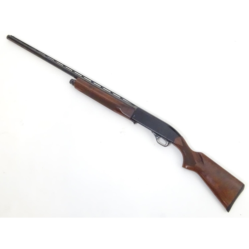 2053 - Shotgun: a Winchester 1400 12 bore semi automatic shotgun, 28 barrel with 2 3/4 chamber, wide ventil... 