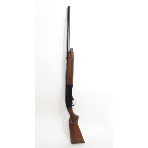 2053 - Shotgun: a Winchester 1400 12 bore semi automatic shotgun, 28 barrel with 2 3/4 chamber, wide ventil... 