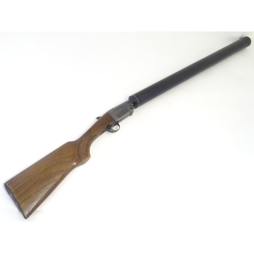 2054 - Shotgun: a Gunsport Hushpower 12 bore folding silenced single barrel shotgun, 29 fully moderated bar... 