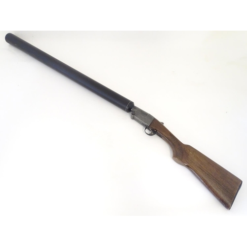 2054 - Shotgun: a Gunsport Hushpower 12 bore folding silenced single barrel shotgun, 29 fully moderated bar... 