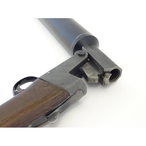 2054 - Shotgun: a Gunsport Hushpower 12 bore folding silenced single barrel shotgun, 29 fully moderated bar... 