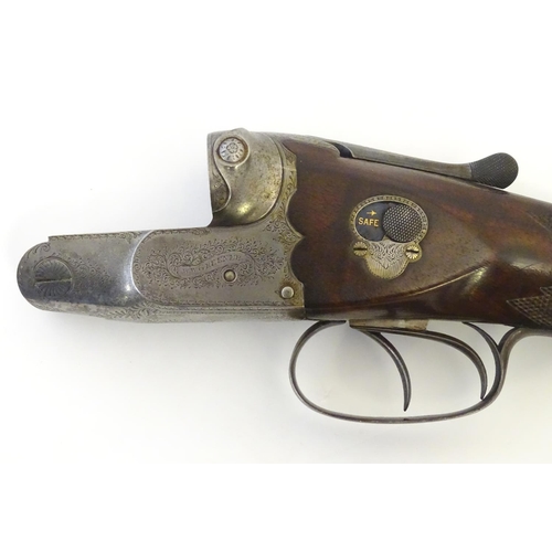 2061 - Shotgun: W W Greener, London, a Facile Princeps 12 bore boxlock ejector shotgun, c1890.

28 nitro re... 