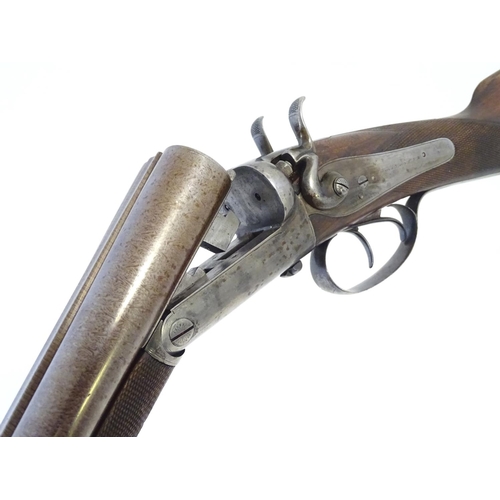 2062 - Shotgun: an Army and Navy CSL, London 12 bore sidelever back action hammergun, cased, c1880. 

30 ni... 