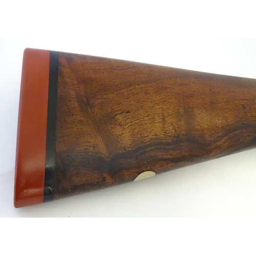 2062 - Shotgun: an Army and Navy CSL, London 12 bore sidelever back action hammergun, cased, c1880. 

30 ni... 