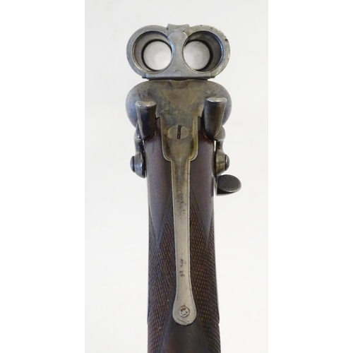 2062 - Shotgun: an Army and Navy CSL, London 12 bore sidelever back action hammergun, cased, c1880. 

30 ni... 