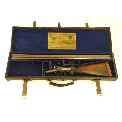 2062 - Shotgun: an Army and Navy CSL, London 12 bore sidelever back action hammergun, cased, c1880. 

30 ni... 