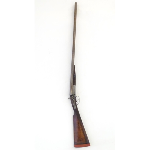 2062 - Shotgun: an Army and Navy CSL, London 12 bore sidelever back action hammergun, cased, c1880. 

30 ni... 