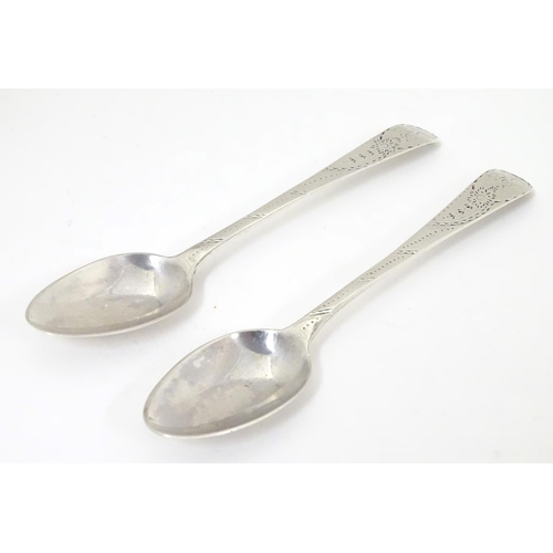 430 - A pair of silver teaspoons with bright cut hallmarked London 1785, maker GS. 5