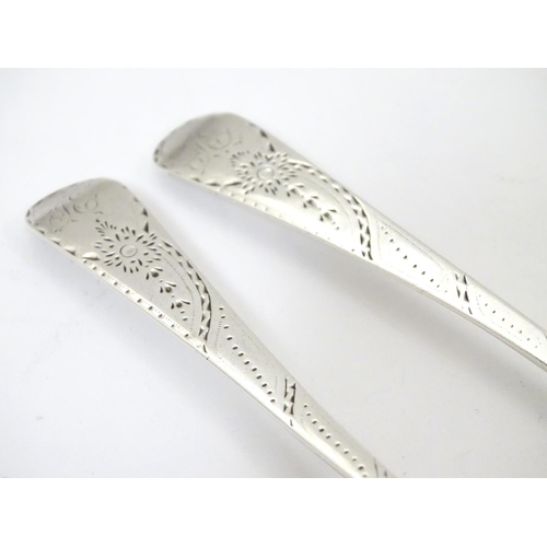 430 - A pair of silver teaspoons with bright cut hallmarked London 1785, maker GS. 5