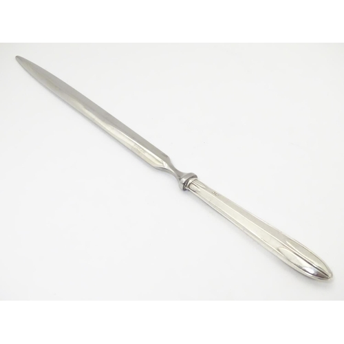 431 - A silver handled paper knife / letter opener, hallmarked Sheffield 1973, maker H. Hunt. 8 1/2