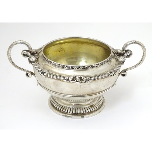 432 - A Victorian silver sugar bowl with twin handles, hallmarked London 1866, maker Edward & John Barnard... 