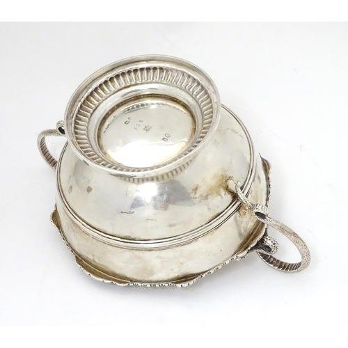 432 - A Victorian silver sugar bowl with twin handles, hallmarked London 1866, maker Edward & John Barnard... 