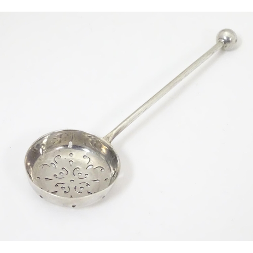 437 - A silver sifter / straining spoon, hallmarked Birmingham 1892, maker Hilliard & Thomason. 4 3/4