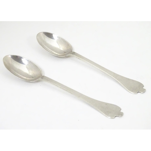 443 - A pair of silver teaspoons with dog nose style handles, hallmarked Sheffield 1933, maker C. W Fletch... 